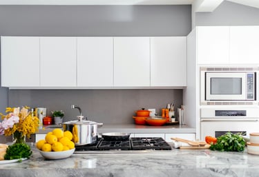modular kitchen with white laminate finish