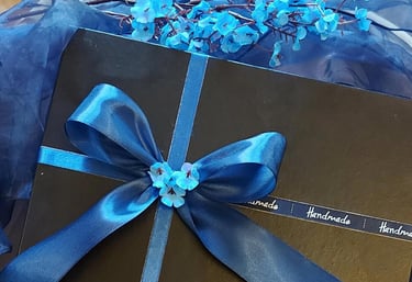 Beautifully packed black and blue box for Ericsson Pakistan. Hand-painted pen holders corporate gifts