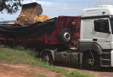 a truck with a large truck behind it