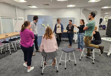 Workshop with participants brainstorming using sticky notes