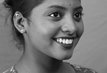Helix ear piercing with gold crown at Dudo’s Piercing Studio in Hyderabad