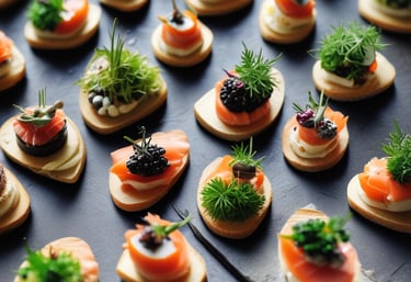 In a café or restaurant setting, there is a counter with trays containing various pastries, including a sugar-dusted cake and a pastry topped with strawberries. Several people dressed in casual clothing and aprons are engaged in activities behind the counter, possibly preparing orders.