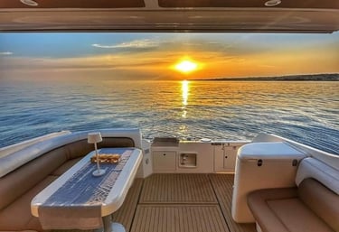 Luxury yacht deck at sunset during private boat tour in Siracusa, Sicily