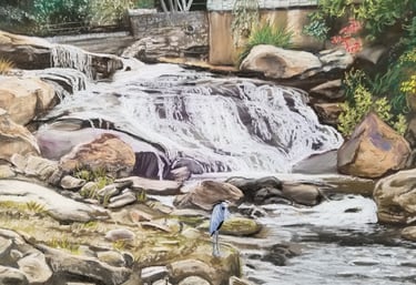 A pastel painting of Falls Park in Greenville, South Carolina with a great blue heron.