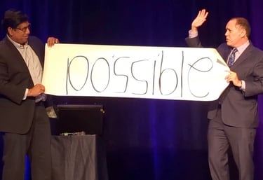 Bay Area mentalist David Martinez reveals a prediction during a trick on stage at a corporate event