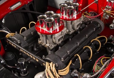 a car engine with a red engine and a red engine