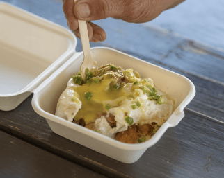 The Gold Rush - taters, Mischief sauce, cheddar cheese, fried egg, jalapeno medley