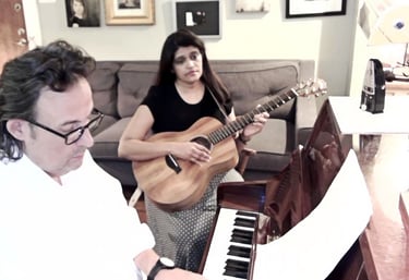Wayland Stephens teaching songwriting to a student., songwriter houston, songwriting tutor