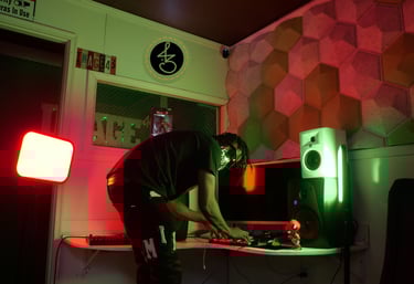 a man in a black shirt is playing a game on a computer