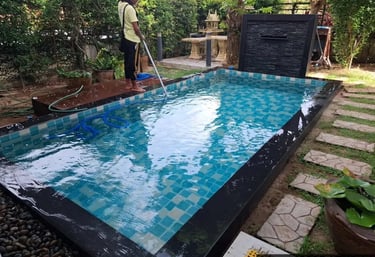 proses pemakuman kolam renang dengan setengan vacum filter