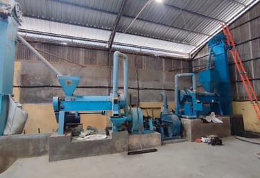 Modern machinery for drying, winnowing, and grading at Dwipa Coffee export operations