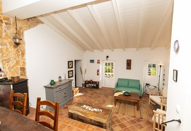 a living room with a couch and a table