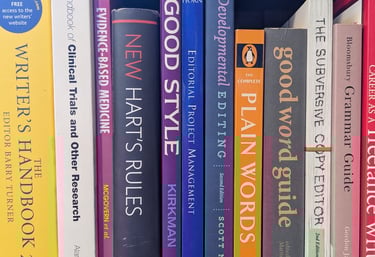 Editorial books on a shelf