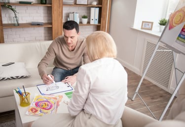 a man and woman sitting on a couch