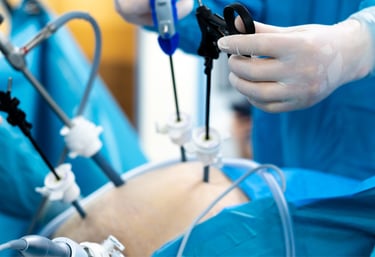 A surgeon preparing for a bariatric procedure in a fully equipped operating room.