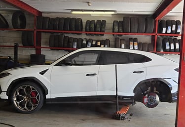Urus getting wheel changed.