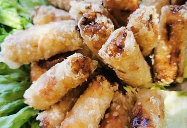 a plate of food with chicken wings and lettuce