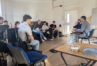 a group of people sitting around a table
