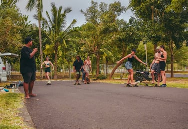 Skater riding a surf skate at Paradise Surf School in Lombok, blending surfing and skateboarding