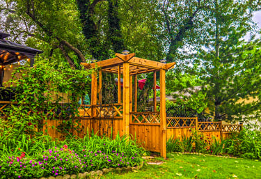 Custom wooden fence with custom made pergola