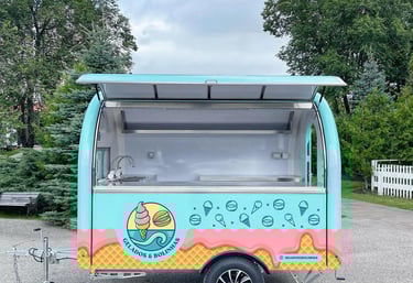 a food truck with a ice cream on it