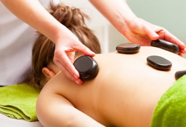 Masaje piedras calientes.