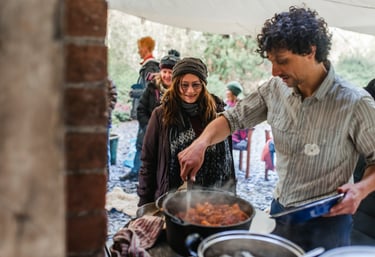 Tom otter from nomad serving food