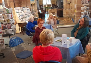 People enjoying a chat and refreshments at the Fairtrade Cafe in Halesowen.