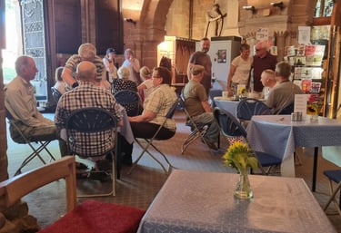 People enjoying fairtrade tea and coffee at Traidpoint Halesowen