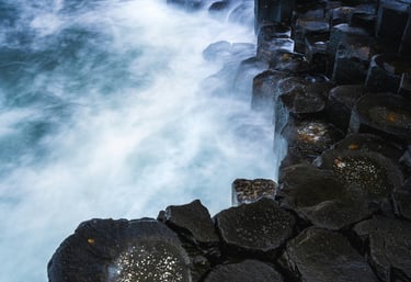 a large rock formation on the edge of a cliff Giant's Causeway