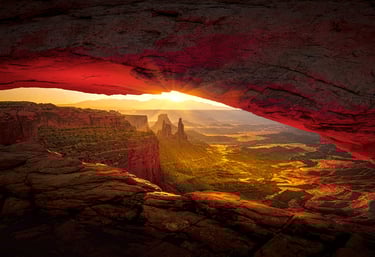 a view of a sunset over a canyon