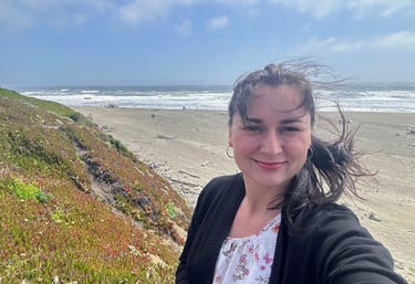 can you remove people from the background and make picture little bit dramatic (I mean beach, sky)