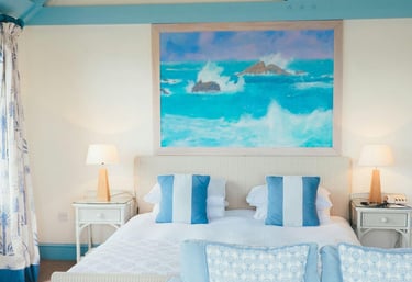 a bedroom with a bed and a couch