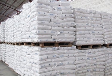 a pallet of bags of bags of ricepvc finished goods warehouse