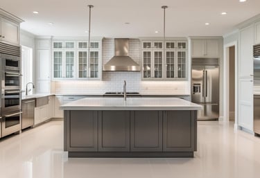 a kitchen with a large island and stainless steel appliances