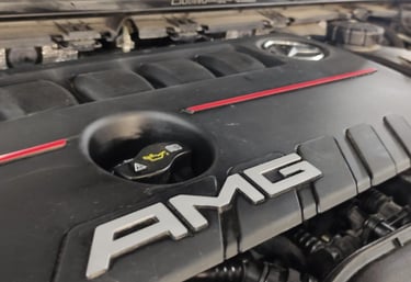 an Enlab Mercedes car engine with the word amg on it