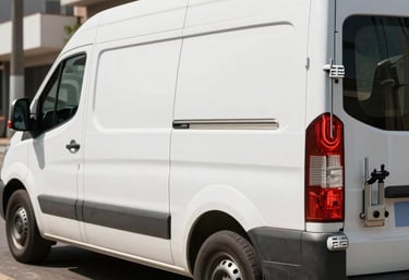A professional service van with locksmith equipment parked on a typical Guarulhos street. Modern, clean, and professional appearance under bright sunlight.