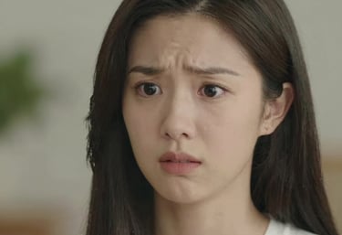 A young adult sitting peacefully by a window, practicing deep breathing with soft natural light.