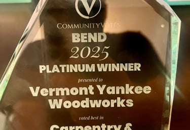 CommunityVotes Bend 2025 Platinum Winner glass award for Vermont Yankee Woodworks in Carpentry and Woodworking.
