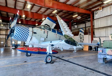 Antique airplane inside a hangar