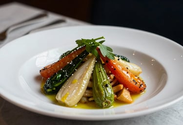 Close-up photography of a beautifully plated artisanal Portuguese dish in a Scandinavian-style restaurant. Soft side lighting highlighting the texture of fresh vegetables.