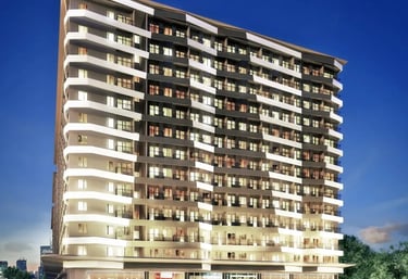 a tall building with a lot of windows and a car parked in front of it