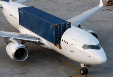 A clean, high-angle shot of a cargo plane being loaded with containers, using a professional aesthetic with steel blue and deep navy tones.