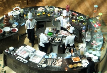 Unistaff catering chefs working at a live food station during an event