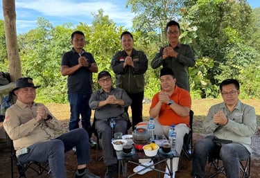 a group of people sitting around a table