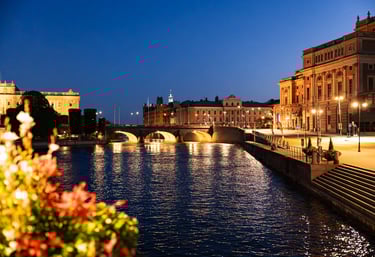 a bridge over a river with a bridge in the background