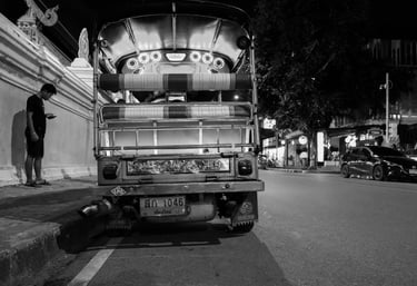 Atmosphere of a street in Chiang Mai, Thailand, including TuK Tuk Taxi