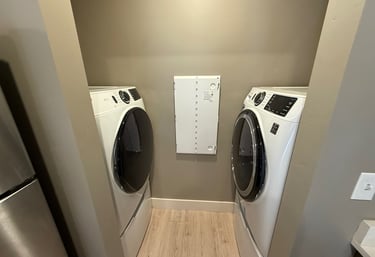 Compact laundry setup with front-loading washer and dryer – Cherry Home Service appliance installati