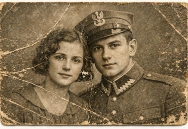 Vintage portrait of a young couple with a man in a Polish military uniform and cap.