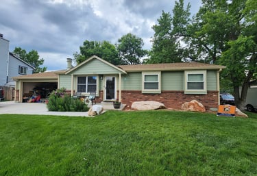 Two-tone residential exterior paint job in a Denver neighborhood.